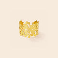 Bracelet manchette doré motif fleurs