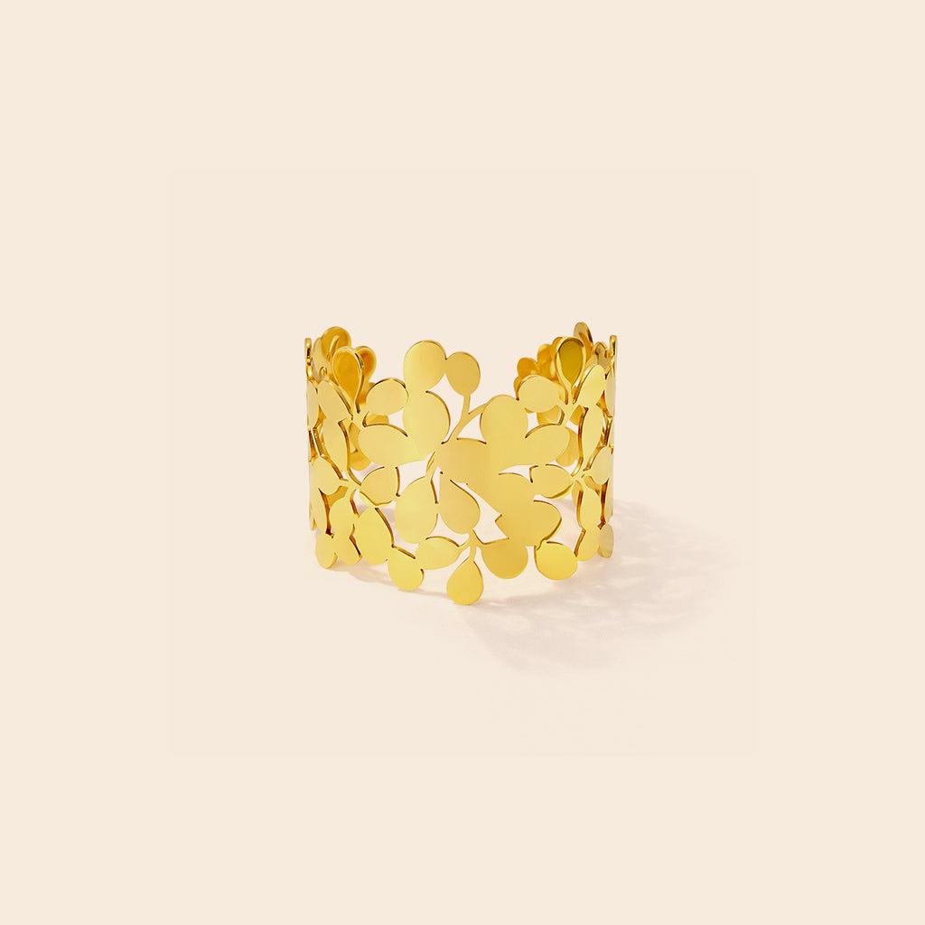 Bracelet manchette doré motif fleurs