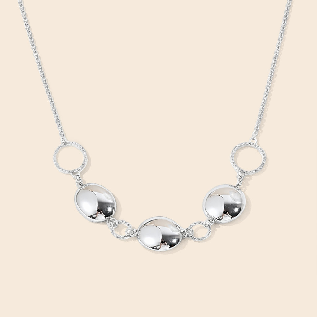 Collier chaîne fine anneaux et pastilles argenté