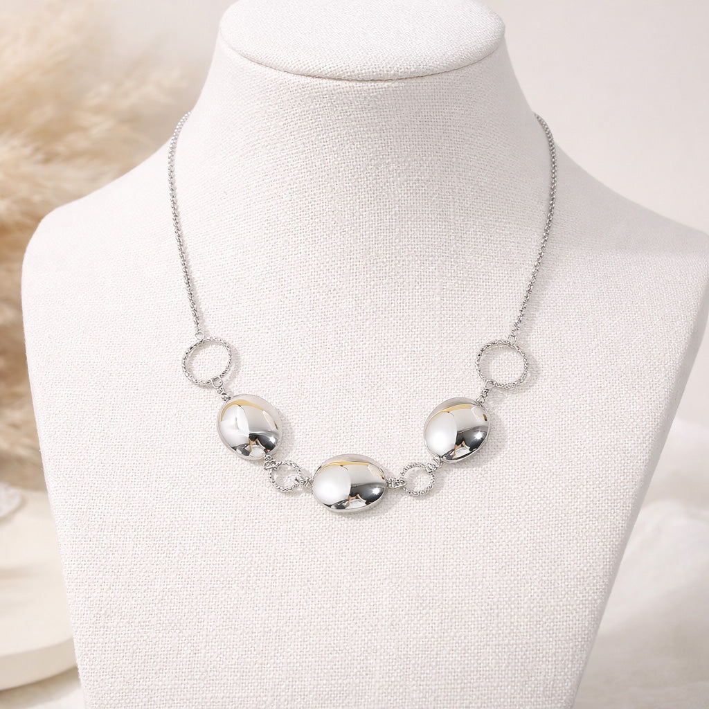 Collier chaîne fine anneaux et pastilles argenté